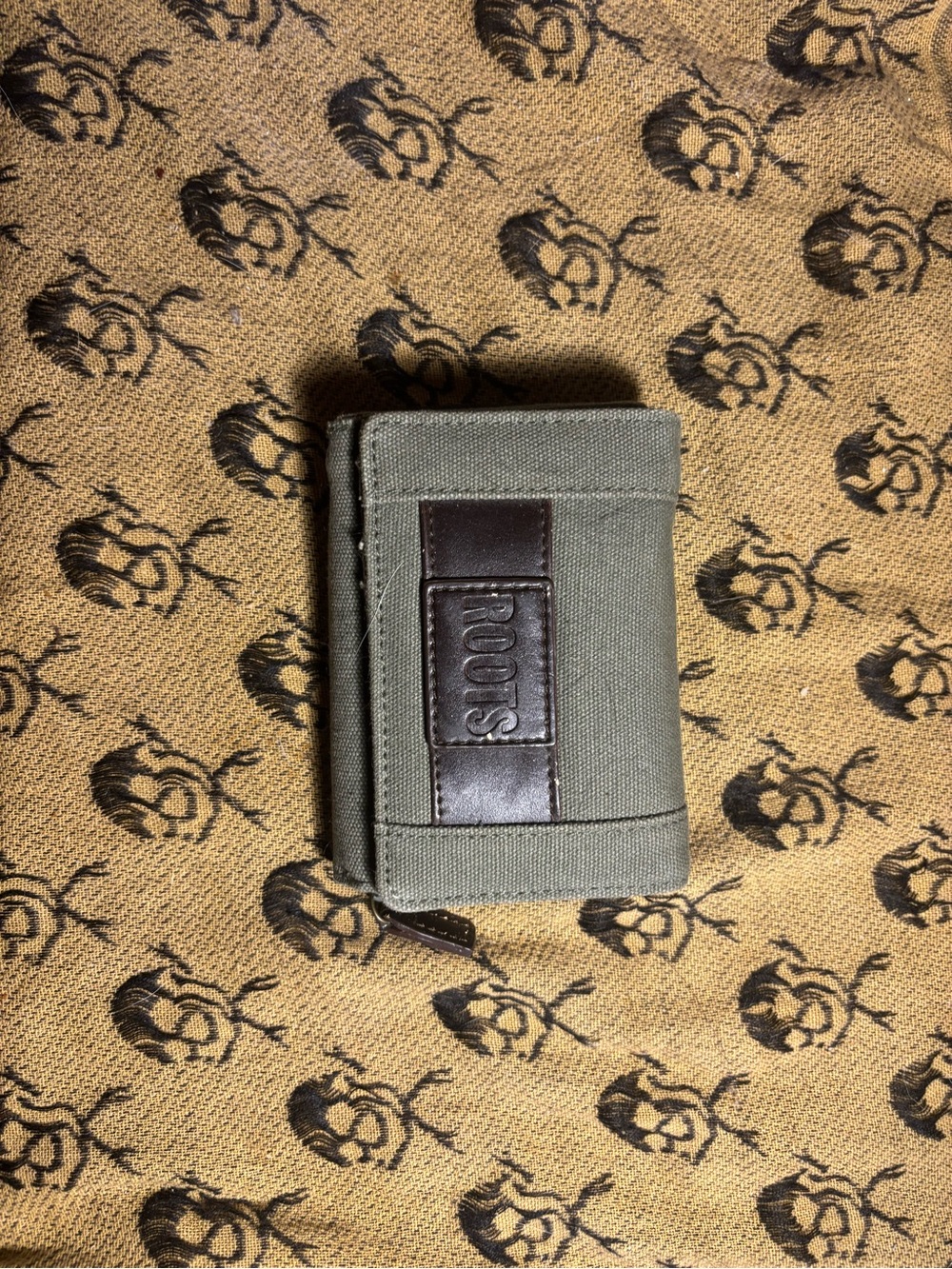 Roots Green Canvas Trifold Wallet with Brown Leather Patch
